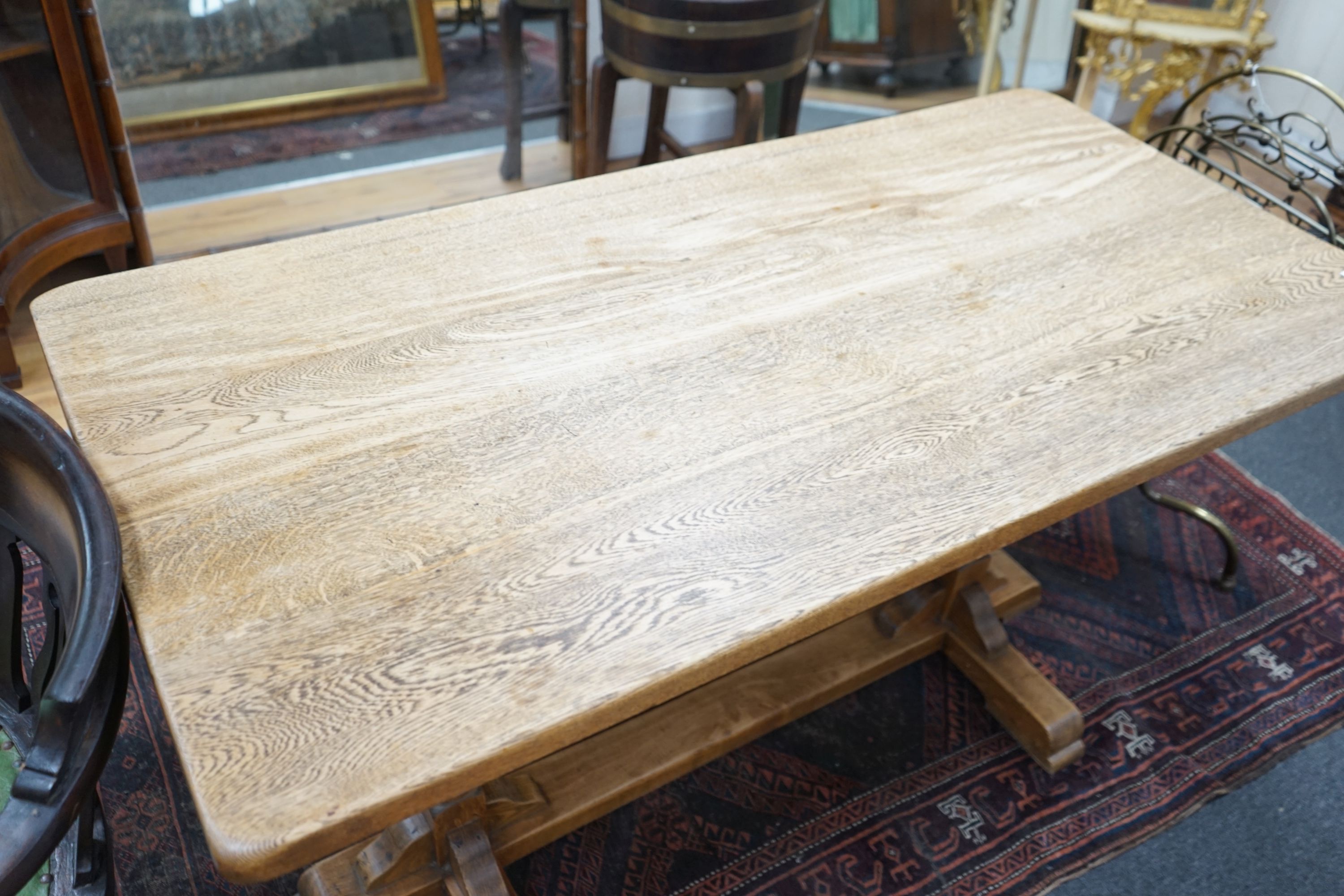 A small 1920s light oak rectangular refectory dining table, width 138cm depth 68cm height 74cm